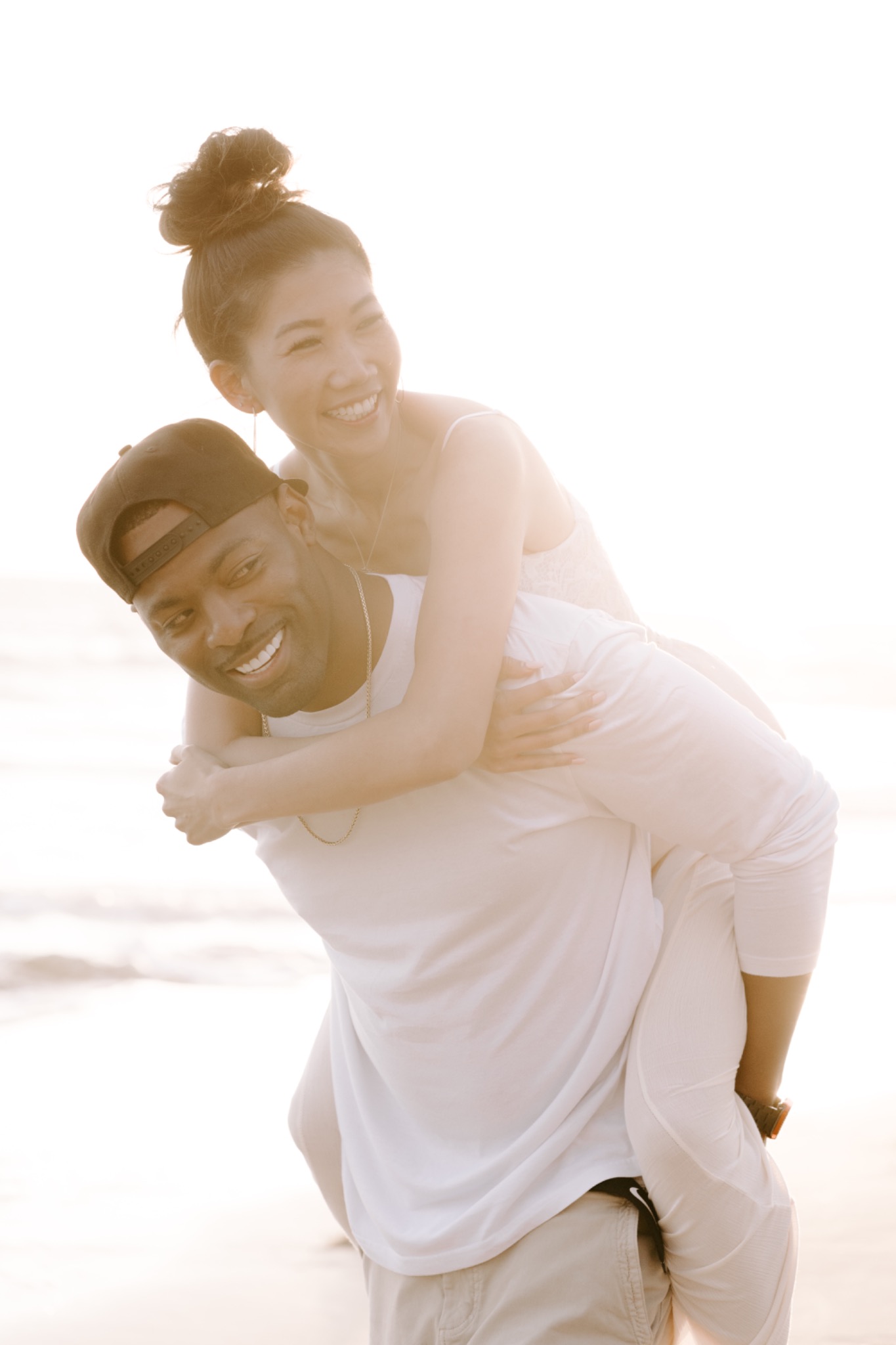 Stephanie and Quay enjoying a moment on the shore